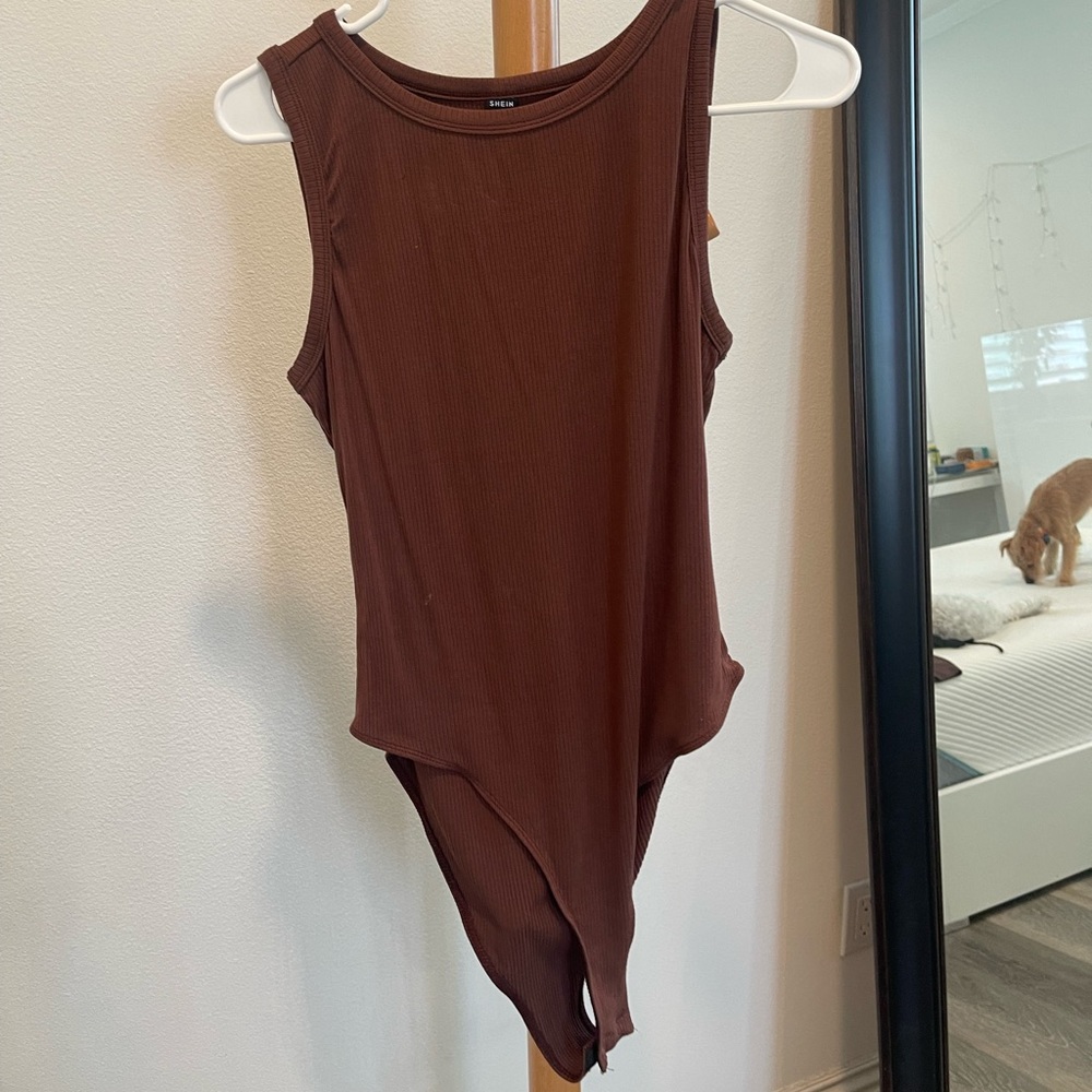 Brown body suit